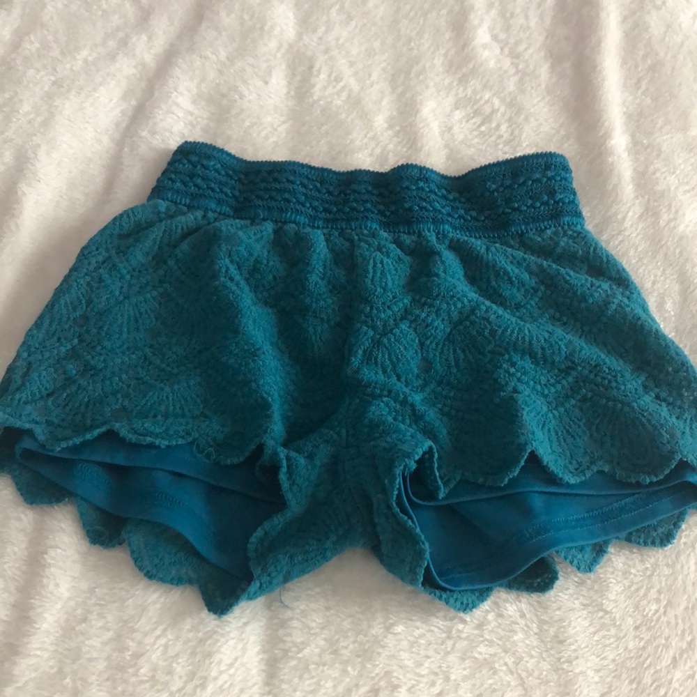 teal shorts